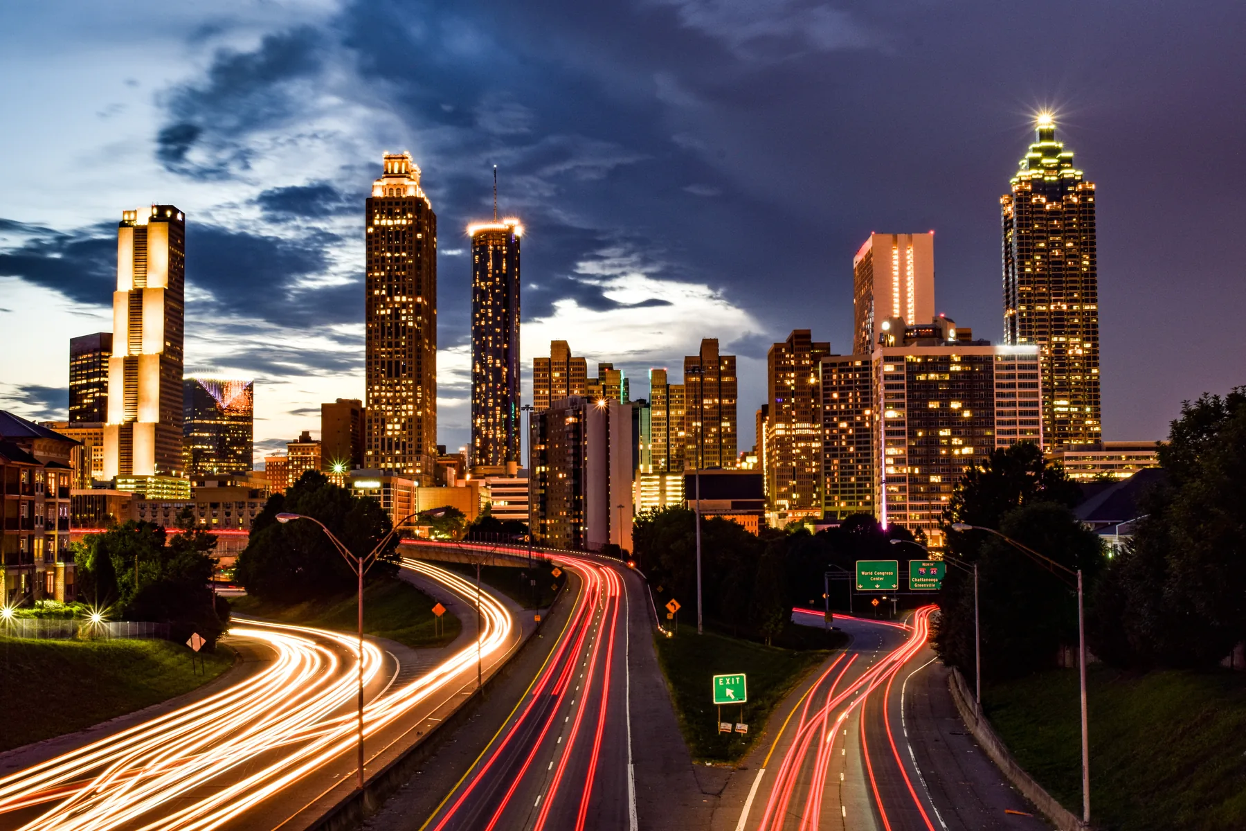Downtown Atlanta at dusk with light trails on the connector
